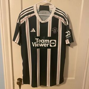 Manchester United 23/24 Adidas green and White Striped Authentic Jersey